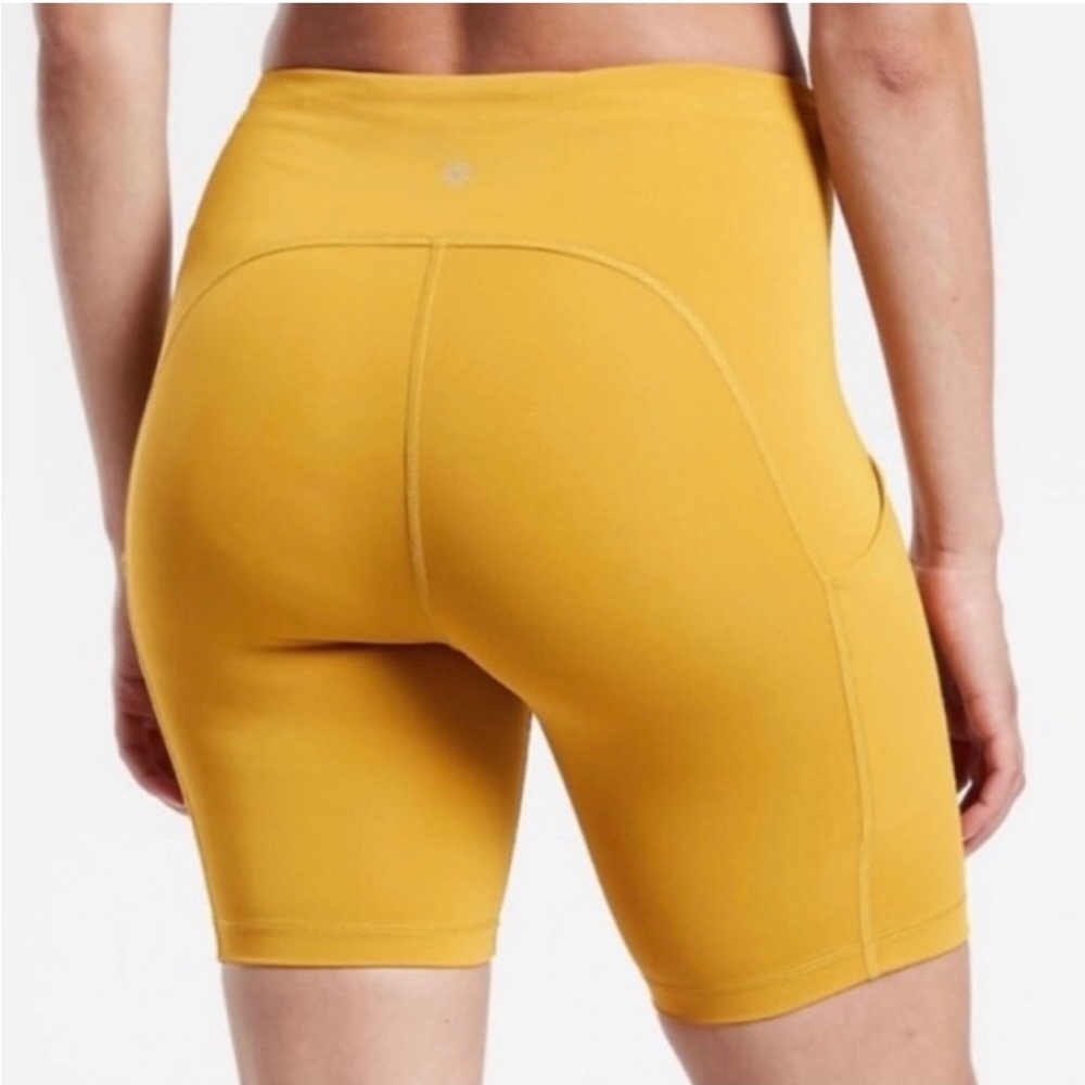 Mustard yellow athleta Ultimate Stash 7" Short